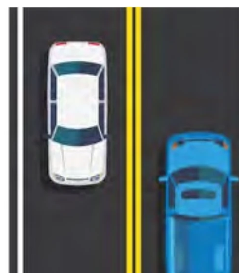 Double solid yellow lines separating opposite traffic lanes